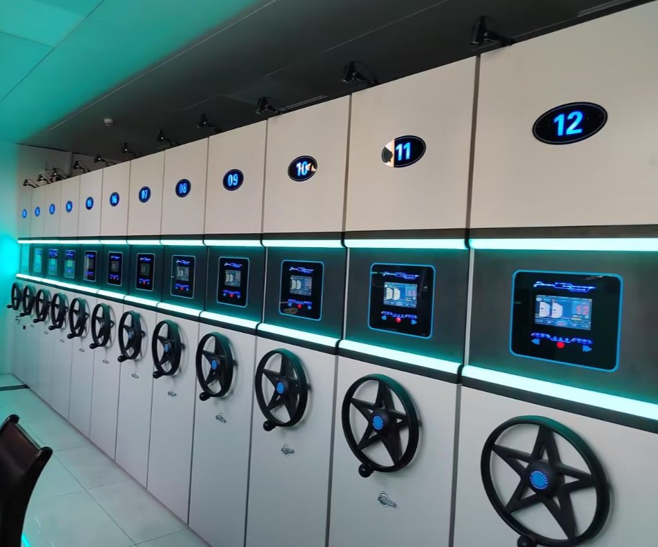 Smart compactor bays with glowing LCD displays and numbered aisles